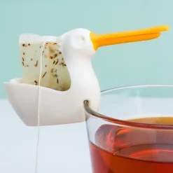 Ditverzinjeniet Thee Eieren|Pelicup theezakjeshouder